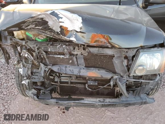 2012 Nissan Xterra X with VIN 5N1AN0NUXCC521582, listed as a Copart auction lot 87224574 with 177,458 mi miles and Salvage title. Bid and sale history available at DreamBid. Image 12.