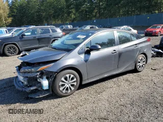 2021 Toyota Prius LE with VIN JTDKAMFP7M3185847, listed as a Copart auction lot 52897465 with 58,996 mi miles and Salvage Title. Bid and sale history available at DreamBid. Image 1.