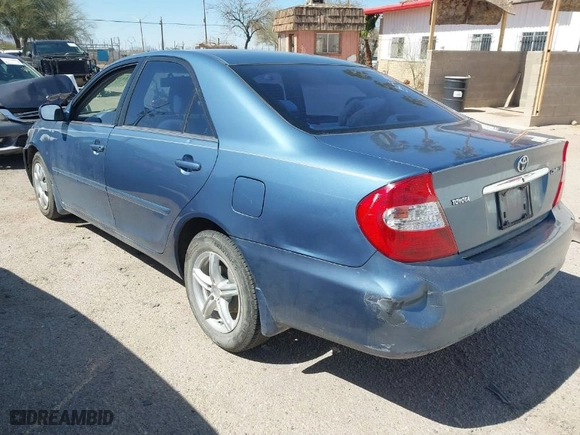 2004 Toyota Camry LE with VIN 4T1BE32K04U907223, listed as a IAAI auction lot 41795149 with 82,411 mi miles. Bid and sale history available at carsss.com. Image 3.