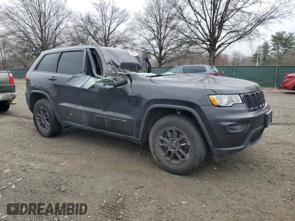 2018 Jeep Grand Cherokee Laredo E with VIN 1C4RJFAG8JC457884, listed as a Copart auction lot 50303215 with Not Provided miles and Salvage Title. Bid and sale history available at DreamBid. Image 4.