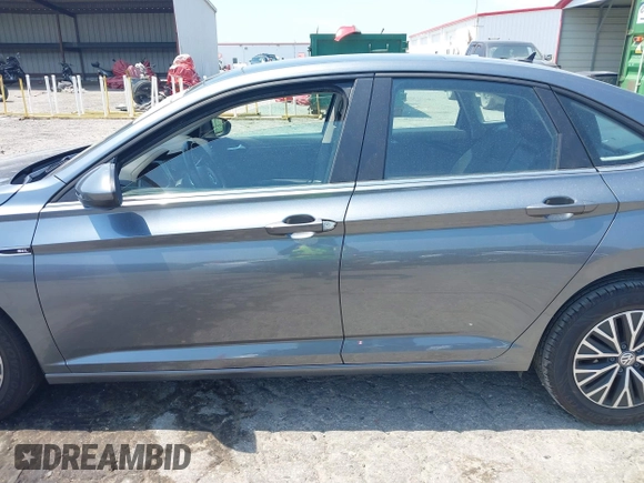 2019 Volkswagen Jetta SEL z VIN 3VWE57BU0KM110267, wystawiony jako IAAI lot #42161272 z przebiegiem 63 955 mil mil oraz . Historia ofert i sprzedaży dostępna na DreamBid. Obrazek 14.