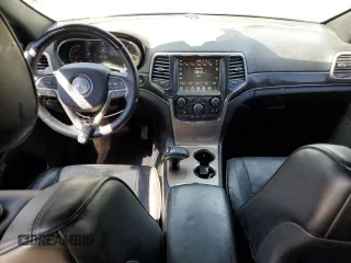 2015 Jeep Grand Cherokee Overland with VIN 1C4RJFCG3FC104439, listed as a Copart auction lot 50780295 with 196,549 mi miles and Salvage Title. Bid and sale history available at carsss.com. Image 8.