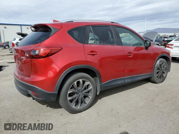 2016 Mazda CX-5 Grand Touring with VIN JM3KE4DY0G0820954, listed as a Copart auction lot 48027785 with 152,448 mi miles and Salvage Title. Bid and sale history available at carsss.com. Image 3.