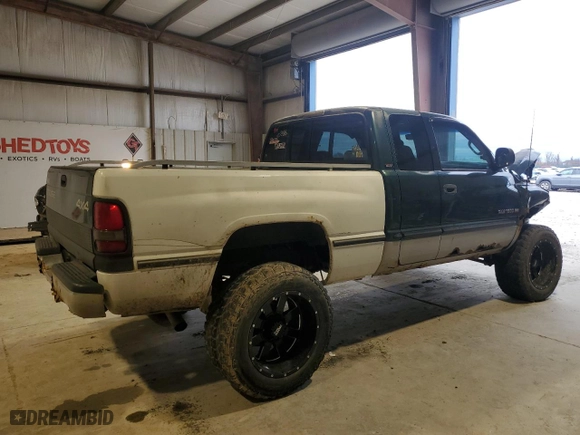 1998 Dodge Ram 1500 with VIN 3B7HF13Y3WG183620, listed as a Copart auction lot 86992874 with 173,441 mi miles and Salvage Title. Bid and sale history available at carsss.com. Image 3.