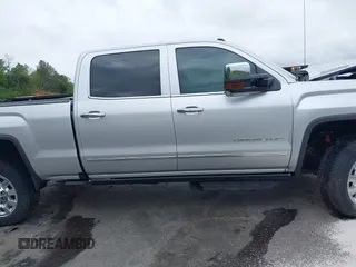 2019 GMC Sierra 2500HD Denali with VIN 1GT12SEY4KF243612, listed as a IAAI auction lot 41962727 with 71,936 mi miles. Bid and sale history available at carsss.com. Image 14.