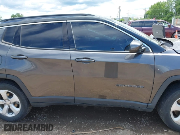 2018 Jeep Compass Latitude with VIN 3C4NJDBB5JT355582, listed as a IAAI auction lot 42351818 with 75,324 mi miles and . Bid and sale history available at DreamBid. Image 14.