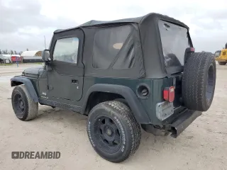 2003 Jeep Wrangler SE with VIN 1J4FA29103P313229, listed as a Copart auction lot 79337984 with 135,668 mi miles and Salvage title. Bid and sale history available at DreamBid. Image 2.