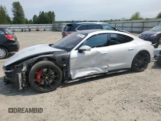 2022 Porsche Taycan GTS with VIN WP0AD2Y14NSA59956, listed as a Copart auction lot 65399344 with 15,466 mi miles and Salvage Title. Bid and sale history available at DreamBid. Image 1.