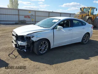 2019 Ford Fusion SEL with VIN 3FA6P0CD8KR117614, listed as a IAAI auction lot 42105025 with 135,801 mi miles and . Bid and sale history available at DreamBid. Image 18.