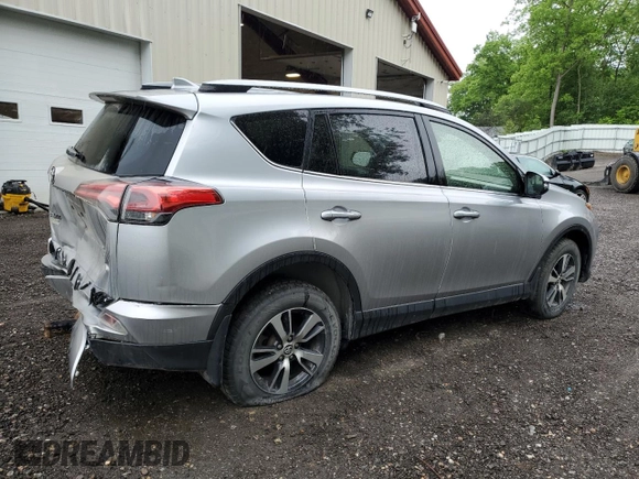 2018 Toyota RAV4 XLE with VIN JTMRFREV2JJ200677, listed as a Copart auction lot 59660535 with 82,283 mi miles and Salvage title. Bid and sale history available at DreamBid. Image 3.