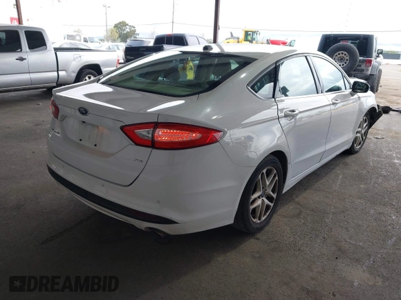 2016 Ford Fusion SE with VIN 3FA6P0H71GR386404, listed as a IAAI auction lot 41974062 with 104,018 mi miles. Bid and sale history available at carsss.com. Image 4.