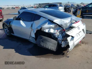 2014 Nissan 370Z Nismo with VIN JN1AZ4EHXEM634418, listed as a IAAI auction lot 41308580 with 84,074 mi miles and . Bid and sale history available at DreamBid. Image 3.