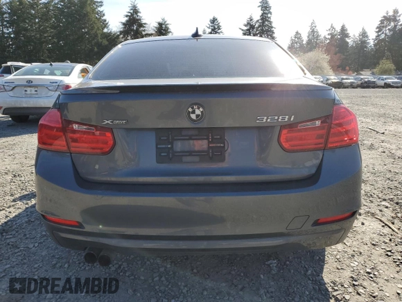 2013 BMW 3 Series 328i xDrive with VIN WBA3B3C56DF530814, listed as a Copart auction lot 52820915 with 144,164 mi miles and Salvage Title. Bid and sale history available at carsss.com. Image 6.