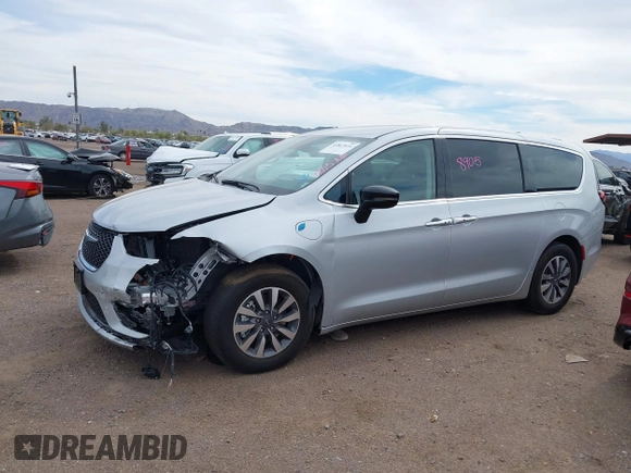 2024 Chrysler Pacifica Hybrid Select z VIN 2C4RC1S78RR188462, wystawiony jako IAAI lot #41813616 z przebiegiem 18 589 mil mil oraz . Historia ofert i sprzedaży dostępna na DreamBid. Obrazek 13.
