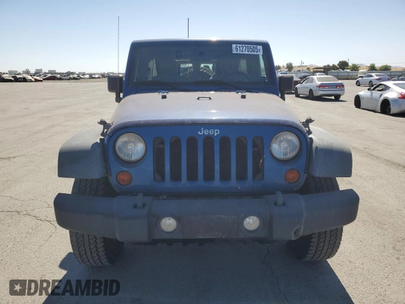 2010 Jeep Wrangler Unlimited Rubicon with VIN 1J4HA6H15AL225234, listed as a Copart auction lot 61270505 with 110,332 mi miles and Clean title. Bid and sale history available at DreamBid. Image 5.