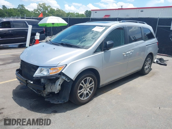 2012 Honda Odyssey EX-L with VIN 5FNRL5H65CB076534, listed as a IAAI auction lot 42440258 with 150,866 mi miles and . Bid and sale history available at DreamBid. Image 18.