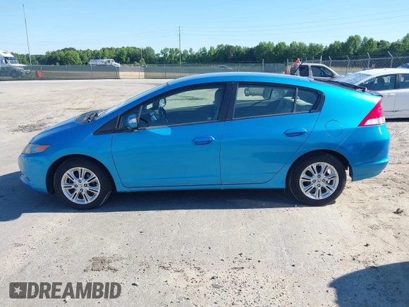 2010 Honda Insight EX with VIN JHMZE2H74AS013148, listed as a IAAI auction lot 42194894 with 114,885 mi miles and . Bid and sale history available at DreamBid. Image 13.