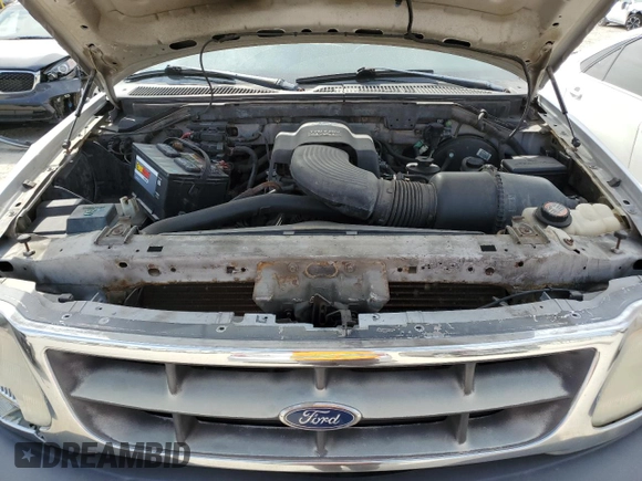 1998 Ford F-150 z VIN 1FTZF18W9WKA65043, wystawiony jako Copart lot #48902695 z przebiegiem 133 727 mil mil oraz Szkoda całkowita • Salvage title. Historia ofert i sprzedaży dostępna na DreamBid. Obrazek 13.