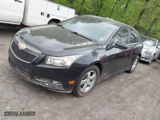 2011 Chevrolet Cruze LT w/2LT with VIN 1G1PG5S99B7246731, listed as a IAAI auction lot 42045728 with 124,000 mi miles. Bid and sale history available at carsss.com. Image 2.