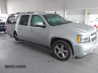 2013 Chevrolet Suburban LTZ with VIN 1GNSCKE03DR368959, listed as a IAAI auction lot 42225938 with 187,121 mi miles and . Bid and sale history available at DreamBid. Image 1.