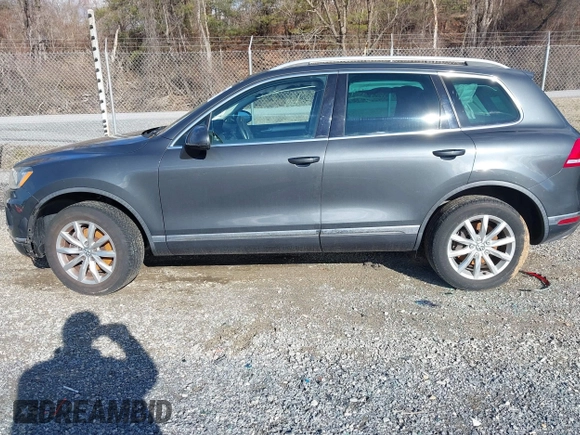 2016 Volkswagen Touareg Sport with VIN WVGEF9BP2GD005315, listed as a IAAI auction lot 41588590 with 134,709 mi miles and . Bid and sale history available at DreamBid. Image 14.
