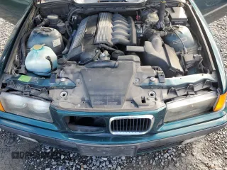 1997 BMW 3-Series 328IC with VIN WBABK8326VET96246, listed as a Copart auction lot 75040704 with 80,274 mi miles and Clean Title. Bid and sale history available at carsss.com. Image 11.