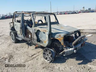 2013 Jeep Wrangler Unlimited Sport z VIN 1C4BJWDG5DL591947, wystawiony jako IAAI lot #41753728 z przebiegiem Nie podano mil oraz . Historia ofert i sprzedaży dostępna na DreamBid. Obrazek 1.