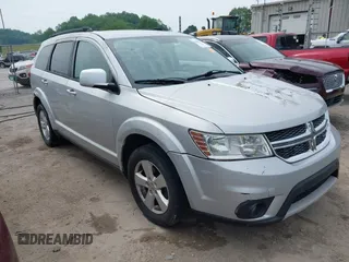 2012 Dodge Journey SXT with VIN 3C4PDCBG5CT134248, listed as a IAAI auction lot 42429581 with 172,309 mi miles and . Bid and sale history available at DreamBid. Image 1.