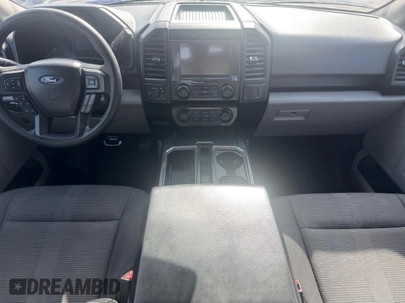 2019 Ford F-150 XL with VIN 1FTEW1CP1KKF22890, listed as a Copart auction lot 61813095 with 63,774 mi miles and Salvage title. Bid and sale history available at DreamBid. Image 8.