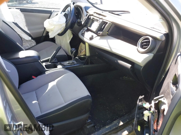 2018 Toyota RAV4 XLE with VIN 2T3RFREVXJW748993, listed as a IAAI auction lot 41878888 with 111,760 mi miles and . Bid and sale history available at DreamBid. Image 5.