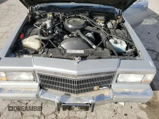 1990 Cadillac Brougham z VIN 1G6DW5476LR721785, wystawiony jako Copart lot #47170405 z przebiegiem Nie podano mil oraz Szkody całkowita. Historia ofert i sprzedaży dostępna na DreamBid. Obrazek 12.