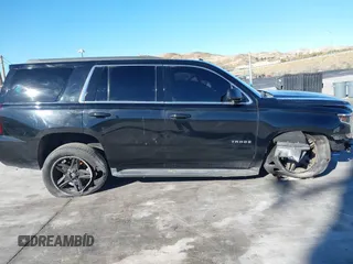 2017 Chevrolet Tahoe LT with VIN 1GNSCBKC4HR187227, listed as a IAAI auction lot 37971302 with 95,009 mi miles and . Bid and sale history available at DreamBid. Image 12.