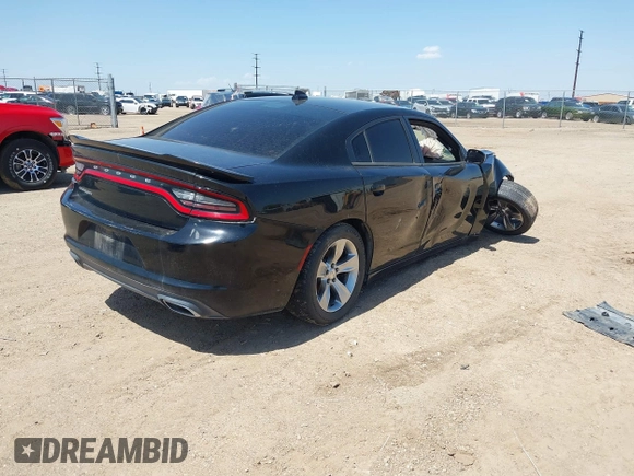 2017 Dodge Charger SXT with VIN 2C3CDXHG0HH571849, listed as a IAAI auction lot 42012518 with 104,586 mi miles and . Bid and sale history available at carsss.com. Image 4.