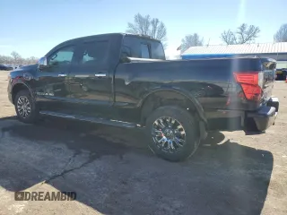 2017 Nissan Titan Pro-4X z VIN 1N6BA1F43HN557633, wystawiony jako Copart lot #46501645 z przebiegiem 94 325 mil mil oraz Szkoda całkowita • Salvage title. Historia ofert i sprzedaży dostępna na DreamBid. Obrazek 2.