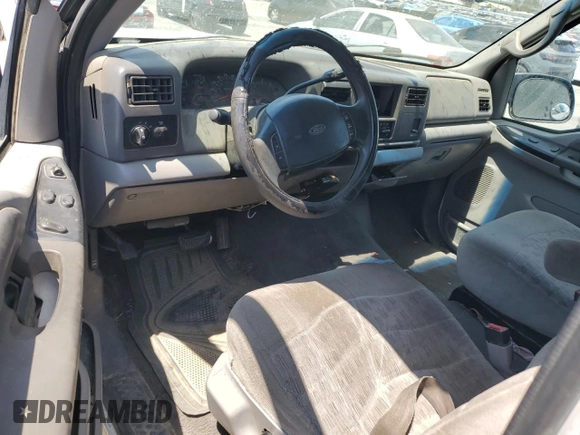 1999 Ford F-250 XL with VIN 1FTNX20L8XEB01923, listed as a Copart auction lot 65404495 with 383,297 mi miles and Salvage title. Bid and sale history available at DreamBid. Image 8.