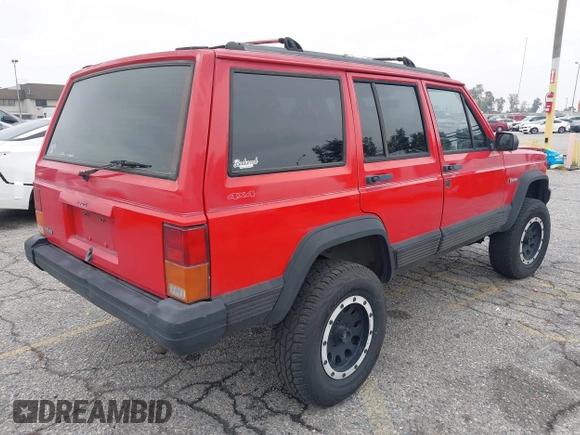 1996 Jeep Cherokee Country with VIN 1J4FJ78S3TL116814, listed as a IAAI auction lot 42131760 with 209,510 mi miles and . Bid and sale history available at DreamBid. Image 4.