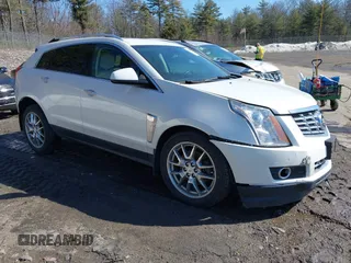 2014 Cadillac SRX Performance Collection z VIN 3GYFNFE30ES586713, wystawiony jako IAAI lot #41791356 z przebiegiem 74 927 mil mil oraz . Historia ofert i sprzedaży dostępna na DreamBid. Obrazek 1.