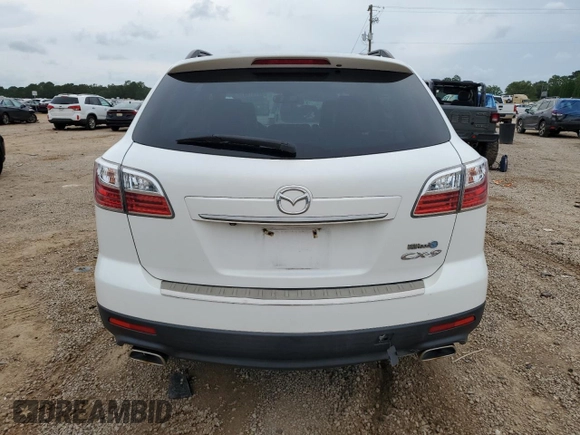 2012 Mazda CX-9 Grand Touring z VIN JM3TB2DA7C0358374, wystawiony jako Copart lot #58741885 z przebiegiem 127 162 mil mil oraz Czysty tytuł • Clean title. Historia ofert i sprzedaży dostępna na DreamBid. Obrazek 6.