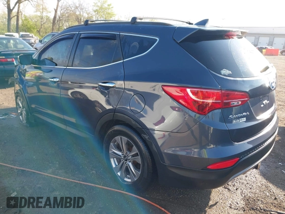 2016 Hyundai Santa Fe z VIN 5XYZUDLB3GG312687, wystawiony jako IAAI lot #42096854 z przebiegiem 162 586 mil mil oraz . Historia ofert i sprzedaży dostępna na DreamBid. Obrazek 3.
