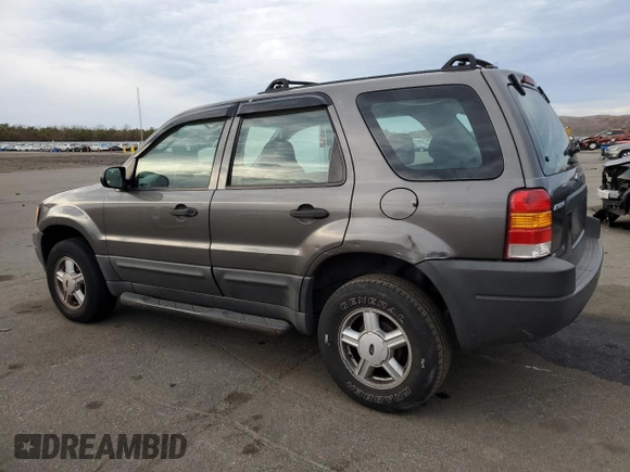 2004 Ford Escape XLS with VIN 1FMYU92184KA91008, listed as a Copart auction lot 80793134 with 159,429 mi miles and Salvage Title. Bid and sale history available at DreamBid. Image 2.