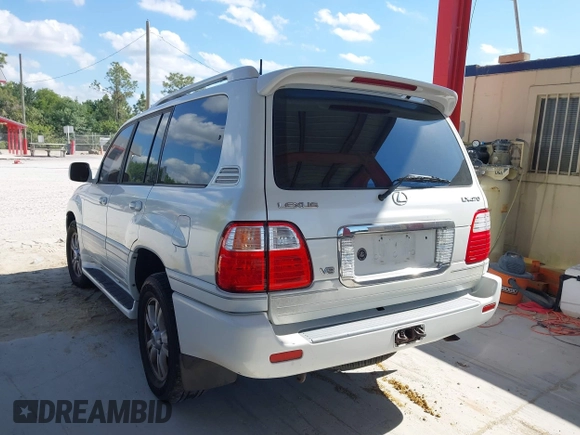 2003 Lexus LX 470 with VIN JTJHT00WX33523623, listed as a IAAI auction lot 42028889 with 317,700 mi miles and . Bid and sale history available at DreamBid. Image 3.
