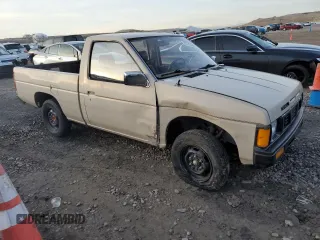 1986 Nissan Hardbody E z VIN JN6ND11S1GW037479, wystawiony jako Copart lot #81775934 z przebiegiem 389 841 mil mil oraz Szkody całkowita. Historia ofert i sprzedaży dostępna na DreamBid. Obrazek 4.