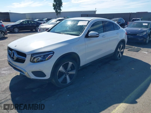 2018 Mercedes-Benz GLC with VIN WDC0J4KB3JF387946, listed as a IAAI auction lot 41494182 with 75,149 mi miles. Bid and sale history available at carsss.com. Image 2.