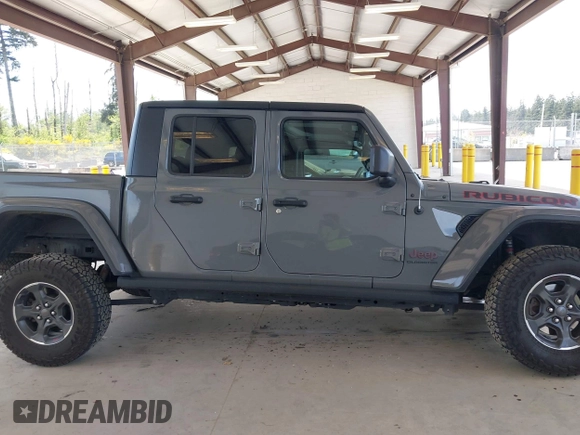 2022 Jeep Gladiator Rubicon with VIN 1C6JJTBG6NL166081, listed as a IAAI auction lot 42204431 with 40,568 mi miles and . Bid and sale history available at DreamBid. Image 14.