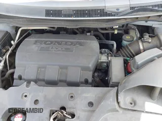 2012 Honda Odyssey EX-L with VIN 5FNRL5H61CB081634, listed as a IAAI auction lot 42760909 with 197,949 mi miles and . Bid and sale history available at DreamBid. Image 10.