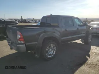 2015 Toyota Tacoma z VIN 3TMLU4EN3FM165978, wystawiony jako Copart lot #49920255 z przebiegiem 134 974 mil mil oraz Szkoda całkowita • Salvage title. Historia ofert i sprzedaży dostępna na DreamBid. Obrazek 3.