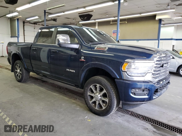2023 Ram 2500 Longhorn with VIN 3C6UR5GL4PG646451, listed as a Copart auction lot 77141314 with 9,852 mi miles and Salvage Title. Bid and sale history available at carsss.com. Image 4.