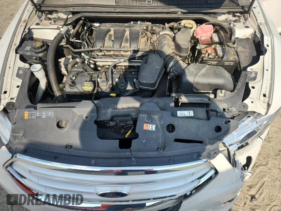 2013 Ford Taurus Limited with VIN 1FAHP2F88DG102737, listed as a Copart auction lot 63327915 with 87,009 mi miles and Salvage title. Bid and sale history available at DreamBid. Image 11.