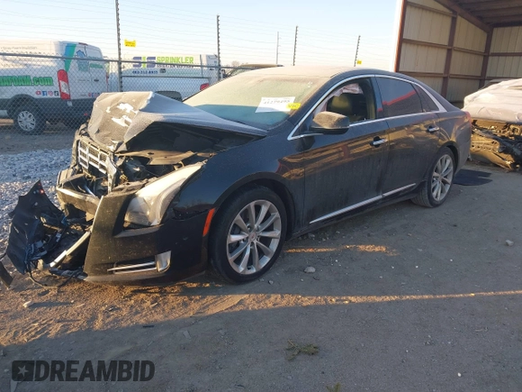 2014 Cadillac XTS Luxury with VIN 2G61M5S32E9289279, listed as a IAAI auction lot 41279495 with 106,655 mi miles. Bid and sale history available at carsss.com. Image 2.