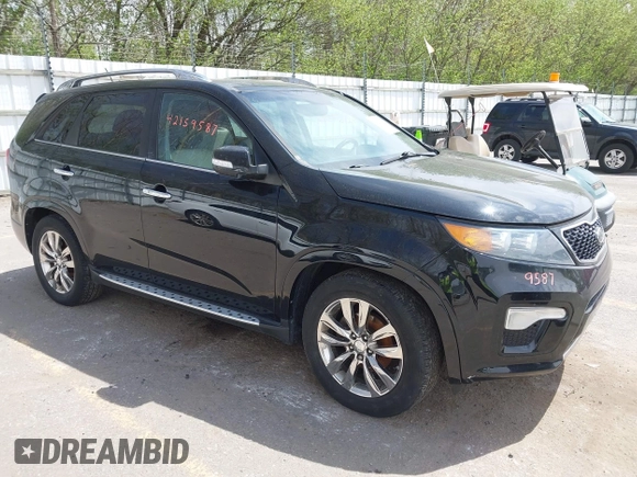 2013 Kia Sorento SX with VIN 5XYKWDA26DG338145, listed as a IAAI auction lot 42159587 with 84,283 mi miles. Bid and sale history available at carsss.com. Image 1.